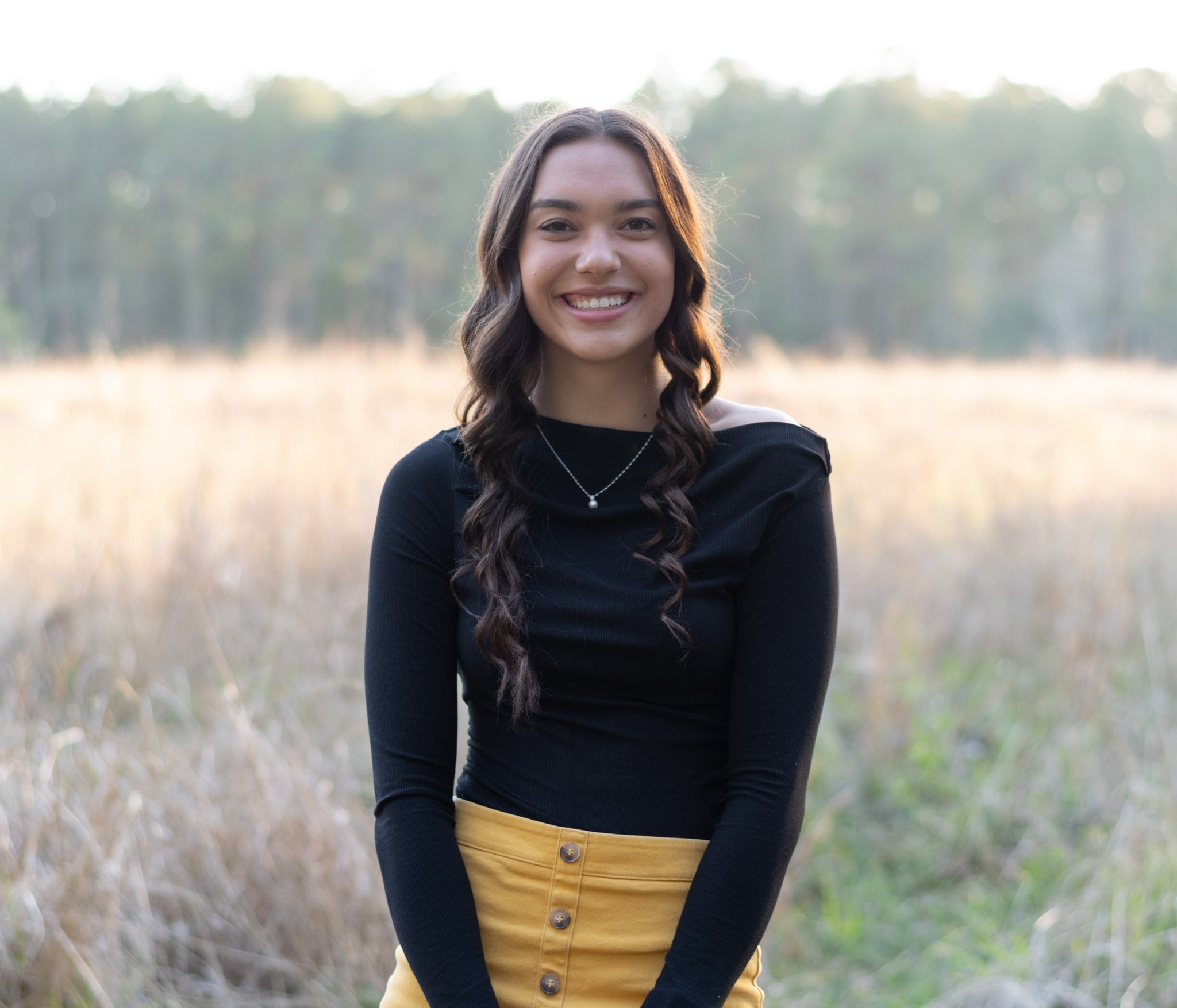 isabelle pugh standing in a field